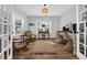 Bright office featuring wood floors, ample natural light, and stylish decor, perfect for a productive workspace at 915 Palmetto St., Georgetown, SC 29440