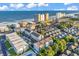 Scenic aerial view of coastal community with ocean view, highlighting complex amenities at 9581 Shore Dr. # 127, Myrtle Beach, SC 29572