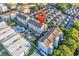 A stunning aerial view shows the condo complex, its pool, and proximity to adjacent townhouse community at 9581 Shore Dr. # 127, Myrtle Beach, SC 29572