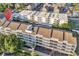 Bird's-eye view of a multi-story condo building with swimming pools and well-maintained landscaping at 9581 Shore Dr. # 127, Myrtle Beach, SC 29572