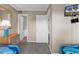 Shared bedroom with twin beds, featuring beach-themed decor and TV at 9581 Shore Dr. # 127, Myrtle Beach, SC 29572