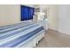Comfortable bedroom featuring a plush bed, dresser, and beach-themed accessories at 9581 Shore Dr. # 127, Myrtle Beach, SC 29572