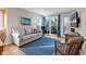 Relaxing living room with comfortable seating, stylish decor, and sliding doors to a private balcony at 9581 Shore Dr. # 127, Myrtle Beach, SC 29572