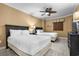 Comfortable bedroom featuring two beds, a ceiling fan, and dark wood furniture at 100 North Beach Blvd. # 515, North Myrtle Beach, SC 29582