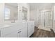 Bright bathroom with double sinks and a walk-in shower at 1020 Sennema Circle, Myrtle Beach, SC 29588