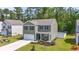 Charming two-story home with an attached two-car garage, manicured lawn, and a fenced-in backyard at 1020 Sennema Circle, Myrtle Beach, SC 29588