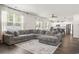 Bright living room featuring a plush sectional sofa and stylish decor at 1020 Sennema Circle, Myrtle Beach, SC 29588