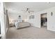 Comfortable main bedroom with a ceiling fan and a large walk-in closet at 1020 Sennema Circle, Myrtle Beach, SC 29588