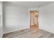 Open-concept living space with hardwood flooring, neutral walls, with a staircase leading to the second floor at 1023 Laconic Dr., Myrtle Beach, SC 29588