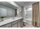 Bright bathroom featuring a modern vanity with white countertop and a clean white shower and tub combo at 1035 Laconic Dr., Myrtle Beach, SC 29588