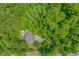 Aerial shot of a home nestled in a lush green forest at 1050 Hagley Dr., Pawleys Island, SC 29585