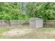 Backyard with a storage shed and a privacy fence at 1050 Hagley Dr., Pawleys Island, SC 29585