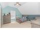 Bedroom with blue walls, nautical theme, and gray furnishings at 1050 Hagley Dr., Pawleys Island, SC 29585