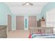 Bedroom with blue walls, carpet, two large closets and gray furniture at 1050 Hagley Dr., Pawleys Island, SC 29585
