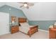 Bright bedroom with light carpet, ceiling fan, and light wood furniture at 1050 Hagley Dr., Pawleys Island, SC 29585