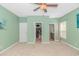 Bright bedroom featuring ensuite bath and large closet providing ample storage at 1050 Hagley Dr., Pawleys Island, SC 29585