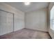 Bedroom featuring a window and closet, providing ample storage space and comfort at 1058 Sea Mountain Hwy. # 4-203, North Myrtle Beach, SC 29582