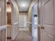 Inviting hallway featuring carpeted floors, neutral walls, and access to a bathroom and bedroom at 1058 Sea Mountain Hwy. # 4-203, North Myrtle Beach, SC 29582
