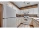 Functional kitchen showcasing ample white cabinetry, essential appliances, and a practical layout for cooking and storage at 1058 Sea Mountain Hwy. # 4-203, North Myrtle Beach, SC 29582