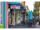 Quaint street view with an ice cream shop and outdoor seating under a blue sky at 1058 Sea Mountain Hwy. # 4-203, North Myrtle Beach, SC 29582