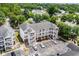 Aerial view of complex with ample parking and multiple balconies at 1058 Sea Mountain Hwy. # 9-101, North Myrtle Beach, SC 29582