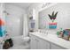 Clean bathroom featuring a shower-tub combo, ample lighting, and a spacious vanity area at 1058 Sea Mountain Hwy. # 9-101, North Myrtle Beach, SC 29582