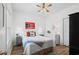 Bedroom with a large bed, modern decor, and a ceiling fan for added comfort at 1058 Sea Mountain Hwy. # 9-101, North Myrtle Beach, SC 29582