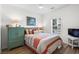 Comfortable bedroom showcasing a decorative bed, natural light, and coordinating furniture pieces at 1058 Sea Mountain Hwy. # 9-101, North Myrtle Beach, SC 29582