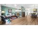 Open-concept living area with a view of the kitchen with bar seating and a dining area at 1058 Sea Mountain Hwy. # 9-101, North Myrtle Beach, SC 29582