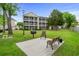 Outdoor grilling area with furniture near apartment building at 1058 Sea Mountain Hwy. # 9-101, North Myrtle Beach, SC 29582