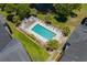 Aerial view of a sparkling pool with lounge chairs surrounded by well-maintained landscaping at 1058 Sea Mountain Hwy. # 9-101, North Myrtle Beach, SC 29582
