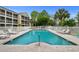 Community pool featuring clear blue water and poolside furniture for relaxation at 1058 Sea Mountain Hwy. # 9-101, North Myrtle Beach, SC 29582