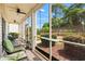 Relaxing screened porch offers serene views of the lush, landscaped backyard at 1058 Sea Mountain Hwy. # 9-101, North Myrtle Beach, SC 29582