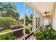 Enjoy outdoor living on this screened porch, overlooking the beautifully landscaped yard at 1058 Sea Mountain Hwy. # 9-101, North Myrtle Beach, SC 29582