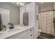 Bathroom with marble countertop, black plumbing fixtures, and shower at 109 Obd Way, Myrtle Beach, SC 29588