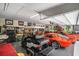 Spacious garage featuring a golf cart, two sports cars, and extensive storage at 109 Obd Way, Myrtle Beach, SC 29588