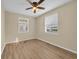 Bedroom featuring wood-look flooring, a ceiling fan, and natural light at 1107 Blue Ridge Trail, North Myrtle Beach, SC 29582
