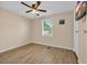 Bedroom featuring wood-look flooring, a ceiling fan, and natural light at 1107 Blue Ridge Trail, North Myrtle Beach, SC 29582