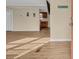 Spacious living room featuring a light wood floor, open layout and TV at 1107 Blue Ridge Trail, North Myrtle Beach, SC 29582