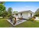 Backyard patio area for outdoor dining and entertaining, with a view of the home and yard at 1127 Pine Dr., Myrtle Beach, SC 29577