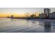 Enjoy sunrise on the pier with an idyllic sandy beach and the silhouette of the city at 1127 Pine Dr., Myrtle Beach, SC 29577