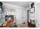View of the room with diplomas hanging and a storage area with organizers at 1127 Pine Dr., Myrtle Beach, SC 29577