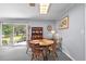 Cozy dining area with sliding glass doors leading to an outdoor patio and backyard at 1127 Pine Dr., Myrtle Beach, SC 29577