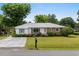Charming single story home with a well maintained lawn and mature landscaping at 1127 Pine Dr., Myrtle Beach, SC 29577