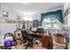 Cozy home office with a desk, chair, and plenty of natural light from the window at 1127 Pine Dr., Myrtle Beach, SC 29577