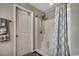 Clean and functional bathroom with a shower stall, neutral color palette, and tile flooring at 113 Adelphia Rd., Loris, SC 29569