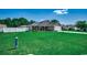 Home featuring a lush front lawn, a two-car garage, and a welcoming facade at 113 Adelphia Rd., Loris, SC 29569