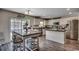 Bright eat-in kitchen featuring stainless appliances, granite countertops, and an island at 113 Adelphia Rd., Loris, SC 29569