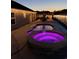 Backyard pool with hot tub, string lights, and patio furniture at 113 Adelphia Rd., Loris, SC 29569