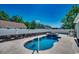 Sparkling kidney-shaped pool with stone accents and clear blue water in a well-maintained backyard at 113 Adelphia Rd., Loris, SC 29569